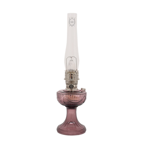 Antique-style oil lamp with rose-colored glass base and tall clear chimney, handcrafted and ideal for Farm, Garden & Tool, Lamps & Lighting, Oil Lamps, Table Lamps, Best Sellers, Homesteading, and Promo Eligible collections.