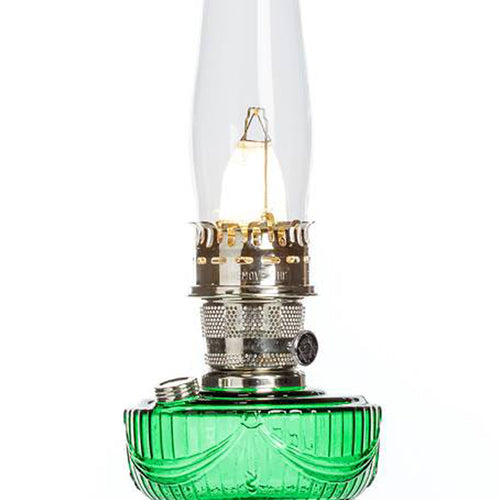 Handcrafted oil lamp featuring a vibrant emerald glass font with a sweeping Lincoln drape pattern, brass burner and knob, tall clear chimney, ideal for Lamps & Lighting and Table Lamps collections.