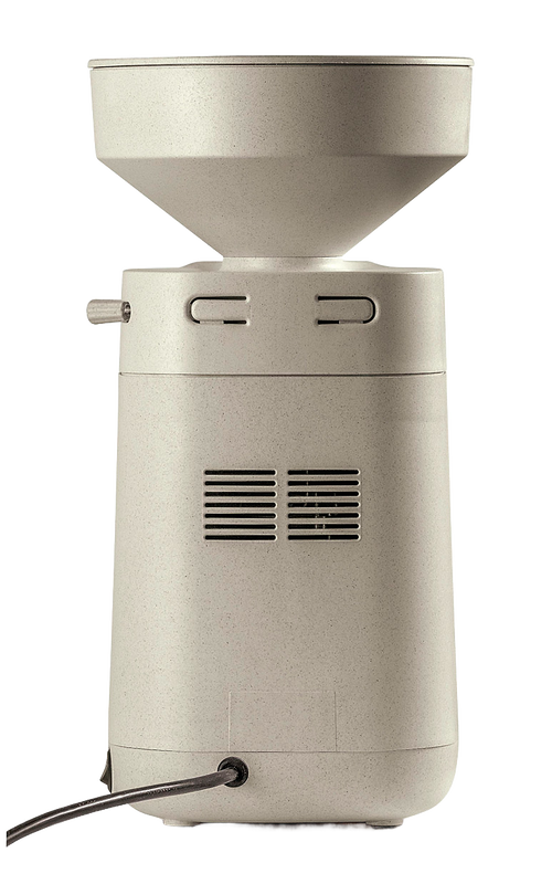 Compact electric grain mill with a beige stone-like finish and a large hopper, designed for efficient home flour milling, featured in Kitchen & Food and Grain Mills collections.