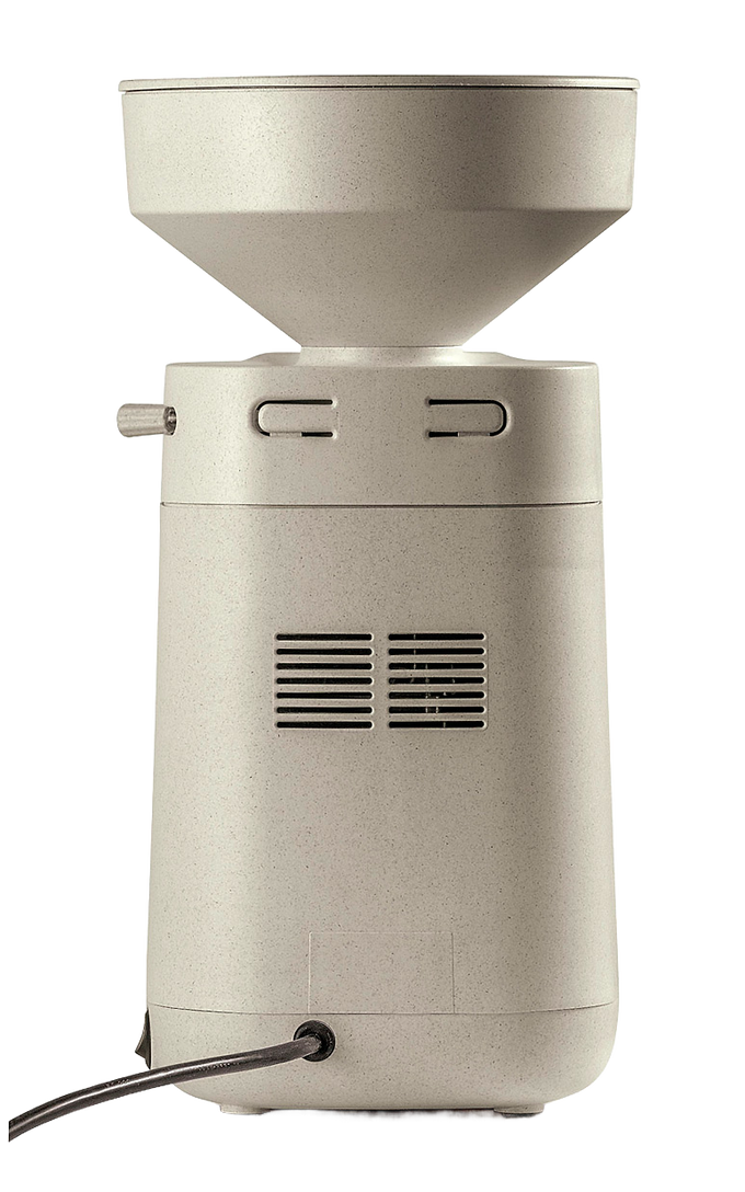 Compact electric grain mill with a beige stone-like finish and a large hopper, designed for efficient home flour milling, featured in Kitchen & Food and Grain Mills collections.