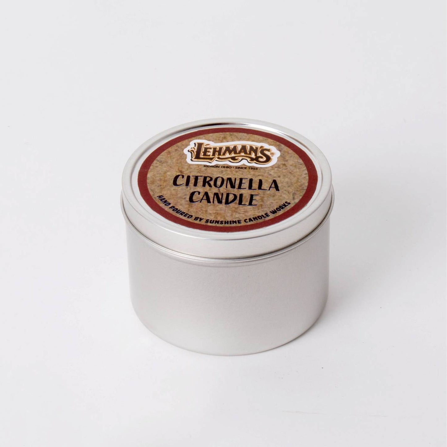 Compact handcrafted citronella candle in a lightweight silver metal tin with branded label, designed for outdoor use in camping, pest control, and garden lighting collections.