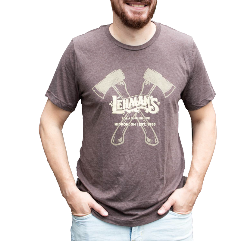 Man wearing a soft, lightweight brown t-shirt featuring two crossed axes and Lehman’s logo with the slogan "For a Simpler Life," ideal for Health & Wellness, Clothing and Accessories, and Best Sellers collections.