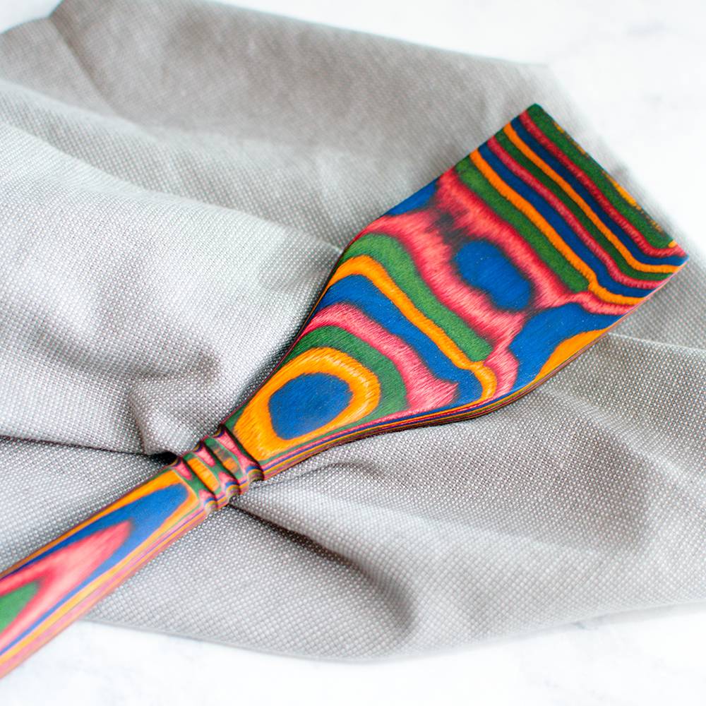 Colorful pakkawood spatula with a sturdy, smooth finish featuring vibrant, layered patterns, crafted for long-lasting use in Kitchen Gadgets, Cooking and Baking Helpers, and Best Sellers collections.