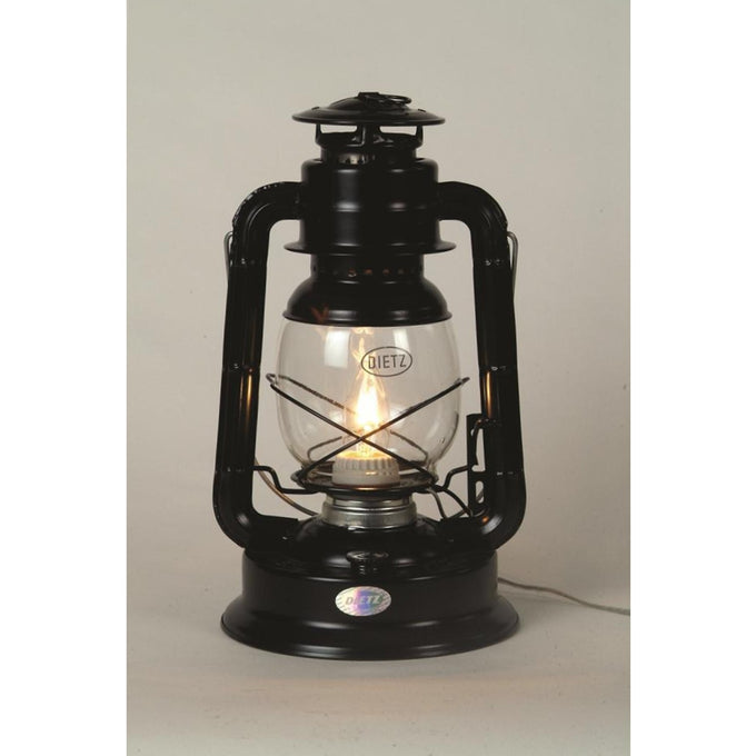 Classic black lantern converted to electric light with visible filament bulb, featuring glass globe and sturdy metal frame, ideal for lamps and lighting collections.