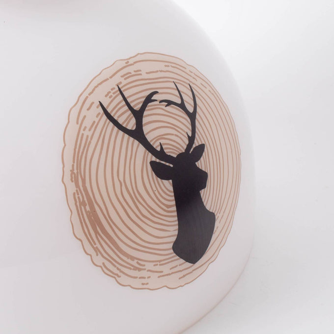 Handcrafted 10-inch glass lamp shade featuring a black silhouette of a deer head set against a circular wood grain pattern, part of Lamps & Lighting, Parts and Accessories, Lamp Shades, Best Sellers, and Promo Eligible collections.