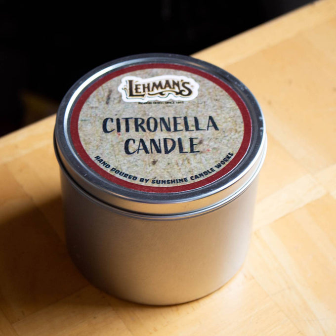 Handcrafted lightweight citronella candle in a simple metal tin with branded label, designed for outdoor use in camping, pest control, and Farm, Garden & Tool collections.