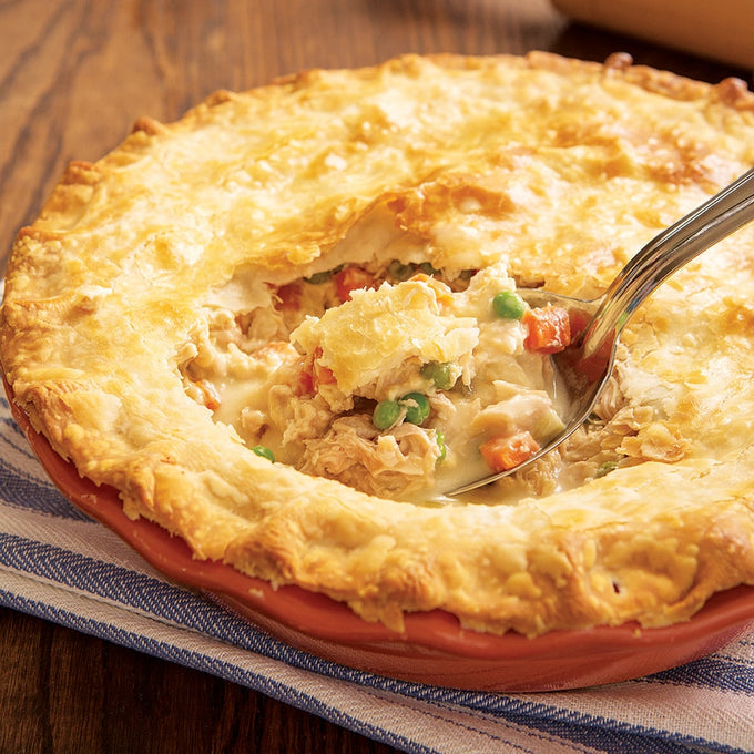 Golden-brown handcrafted turkey pot pie with flaky crust and creamy filling of shredded turkey, peas, and carrots, featured in Farm, Garden & Tool, Kitchen & Food, Emergency Supplies, and Best Sellers collections.