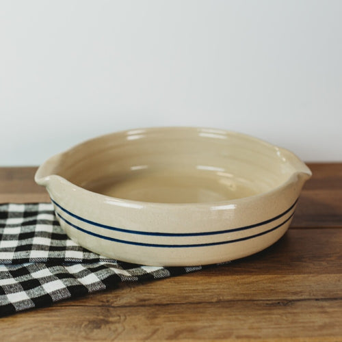 Handcrafted stoneware cornbread pan with double blue stripes on natural glaze, made in USA, featured in Kitchen & Food, Dinnerware, Storage and Serving, and Best Sellers collections.