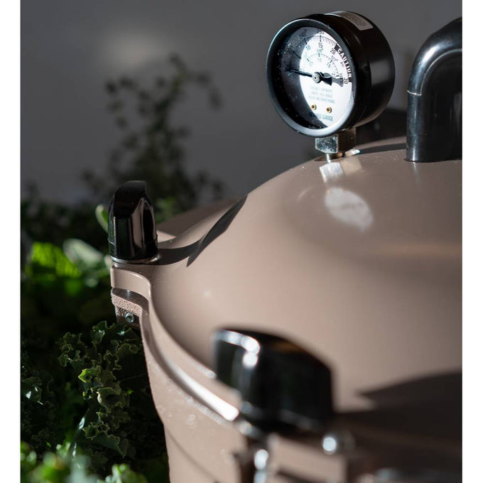 Taupe-colored pressure canner pot with secure locking lid and built-in pressure gauge, ideal for safe food preservation in Kitchen & Food, Canning, and USA Made collections.