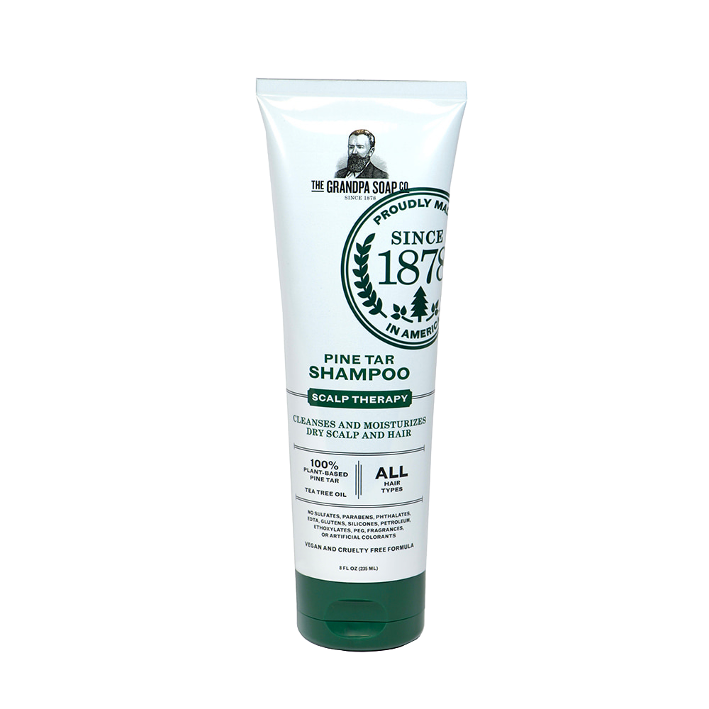 Tube of handcrafted pine tar shampoo featuring scalp therapy formula with tea tree oil, gentle for all hair types, made in USA, part of Health & Wellness and Grooming collections.