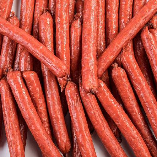 Close-up of handcrafted hickory smoked snack sticks made with pork and beef, a savory protein-rich treat perfect for Kitchen & Food, Snacks and Sweets, Meats, USA Made, Best Sellers, and Promo Eligible collections.