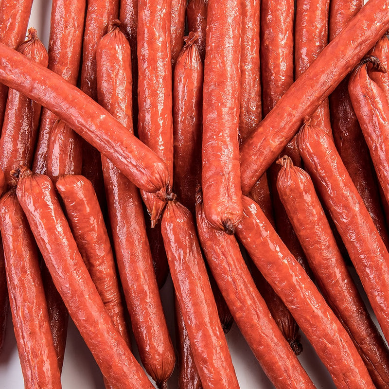 Close-up of handcrafted hickory smoked snack sticks made with pork and beef, a savory protein-rich treat perfect for Kitchen & Food, Snacks and Sweets, Meats, USA Made, Best Sellers, and Promo Eligible collections.