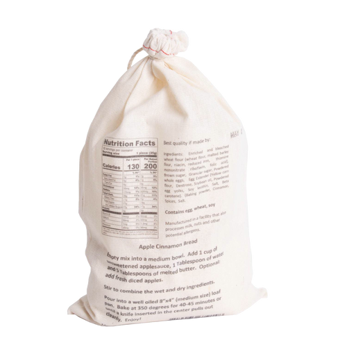 Natural fabric drawstring bag with handcrafted Apple Cinnamon Bread mix featuring detailed nutrition facts and baking instructions, perfect for Kitchen & Food, Pantry, Dry Goods and Mixes, Best Sellers, and Promo Eligible collections.