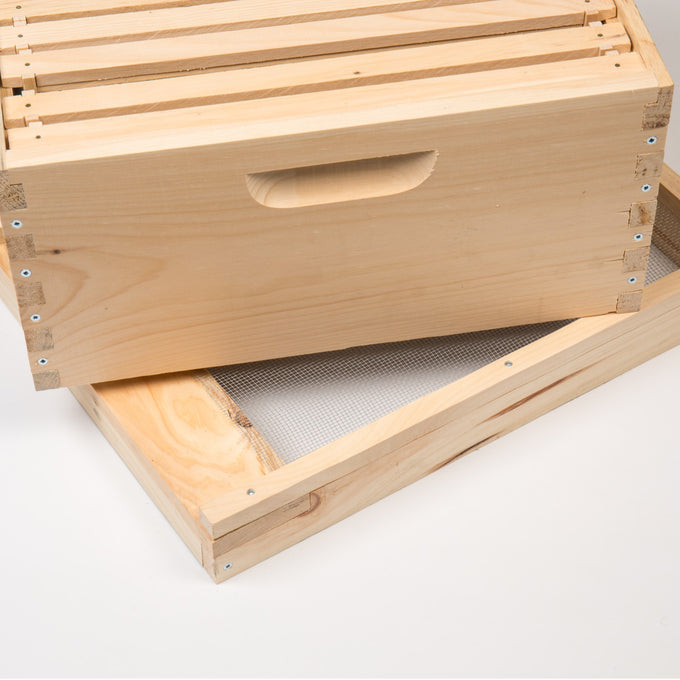 Handcrafted wooden bee deep box with integrated handle and screen bottom, part of Amish made beekeeping supplies, perfect for farm, garden, and USA-made collections.