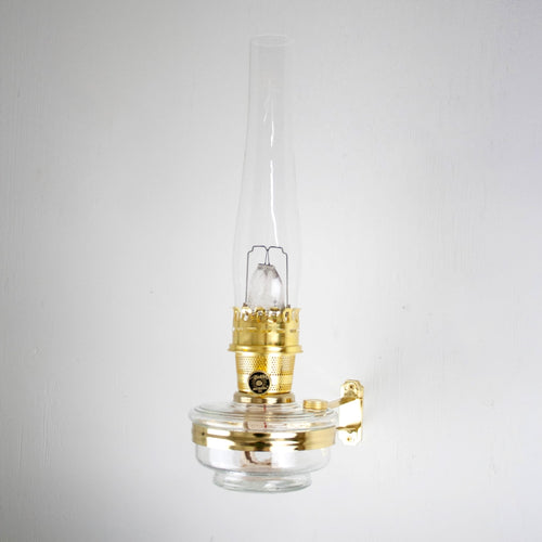 Handcrafted clear Aladdin wall oil lamp with polished brass burner and glass chimney, designed for space-saving illumination in Farm, Garden & Tool, Lamps & Lighting, Emergency Supplies, and Best Sellers collections.