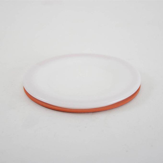 Reusable wide-mouth canning lid with a white top and orange sealing edge, designed for kitchen and food preservation, part of USA made and best sellers collections.
