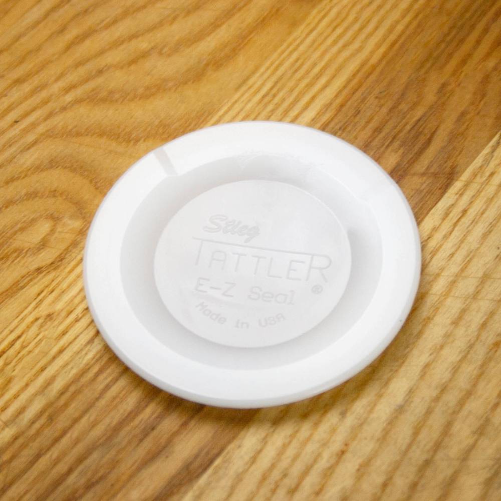 White reusable wide-mouth canning lid with a circular design, made in USA, suitable for Kitchen & Food, Food Preservation, and Canning collections.