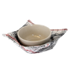 Beige ceramic bowl resting in a handcrafted plaid cotton cozy with red, black, and white pattern, designed to protect hands and surfaces, ideal for Kitchen & Food, Kitchen Textiles, Storage and Serving, Best Sellers, and Promo Eligible collections.