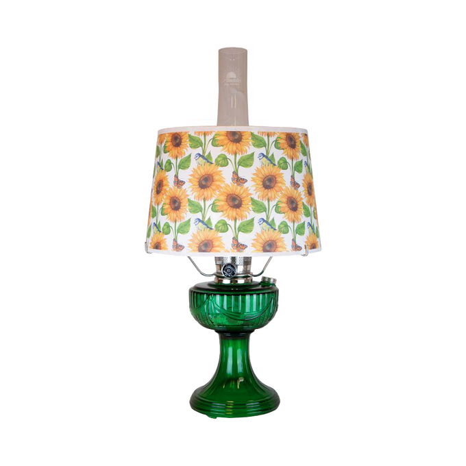 Unique handcrafted oil lamp with an Ohio-made emerald glass base and a bright sunflower-patterned shatterproof parchment shade, perfect for Farm, Garden & Tool and Lamps & Lighting collections.
