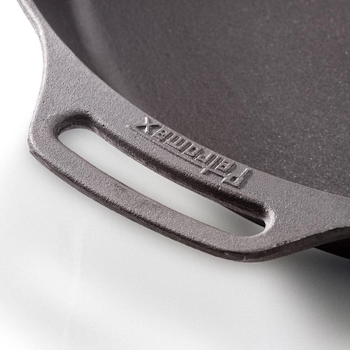 Close-up of the helper grip on a handcrafted cast iron skillet, highlighting durable quality for Farm, Garden & Tool, Kitchen & Food, Camping, Cookware, Cast Iron, Best Sellers, and Promo Eligible collections.
