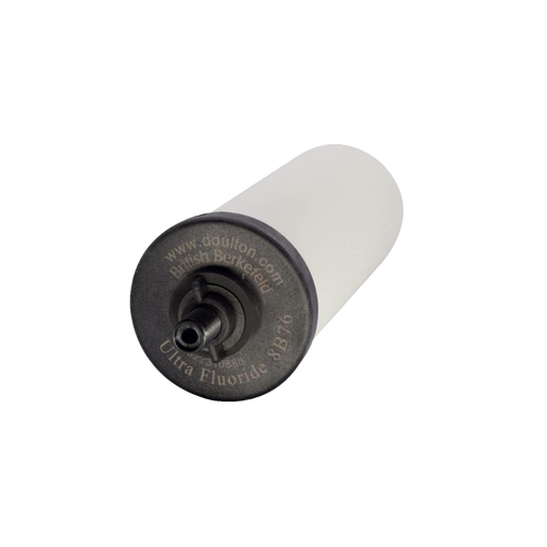 Handcrafted white ceramic water filter element with black threaded end, featuring granular activated carbon for gravity filtration, ideal for farm, garden, and emergency use.