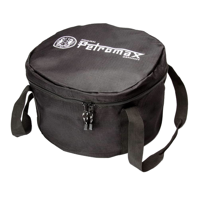Black durable fabric transport bag with sturdy carrying straps and zip closure, designed for securely storing and carrying Dutch ovens, suited for outdoor camping and garden tool use.