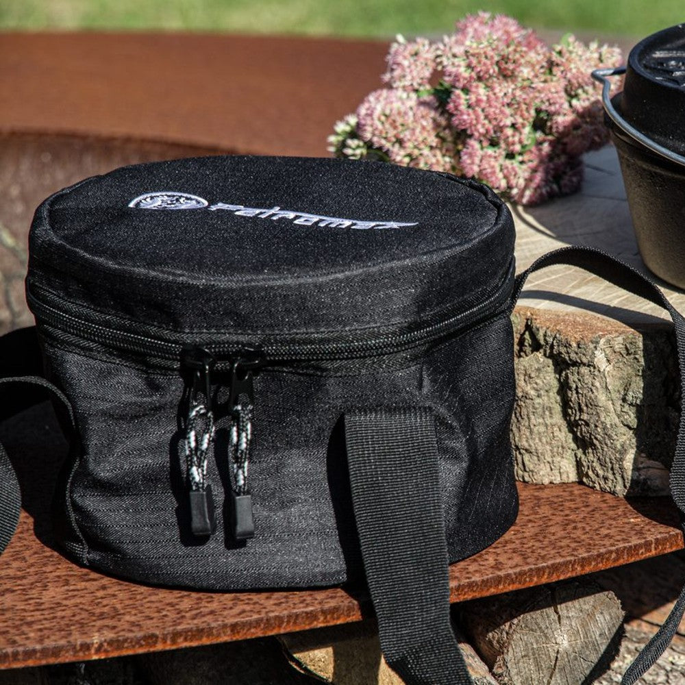 Compact black ripstop fabric bag with dual zippers and a sturdy shoulder strap, designed for secure storage and transport of Dutch ovens, featured in Camping and Farm, Garden & Tool collections.