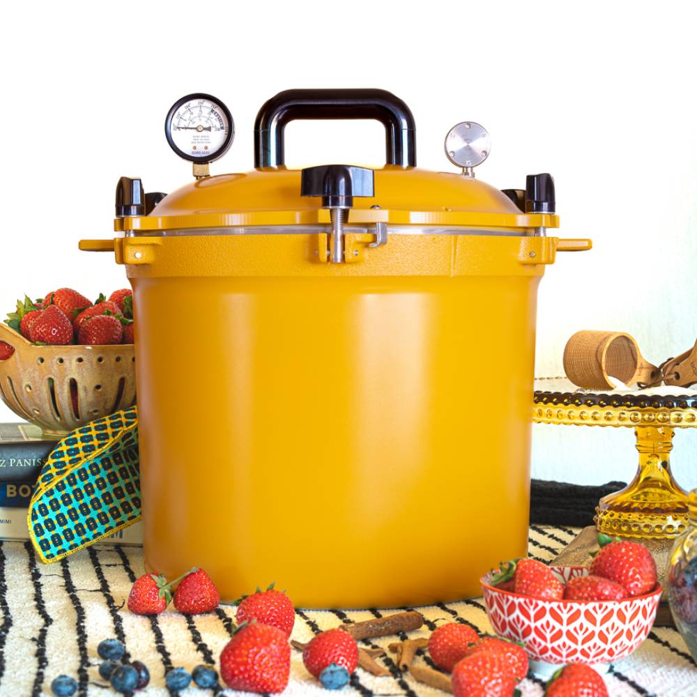 Bright yellow 21.5-quart pressure canner with secure locking lid and pressure gauges, designed for safe food preservation in Kitchen & Food, Food Preservation, Canning, and USA Made collections.