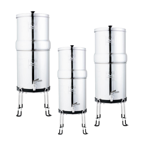 Three polished stainless steel gravity water filters elevated on sturdy raised stands with protective legs, designed for ease of use in Appliances, Emergency Supplies, and Water Heating collections.