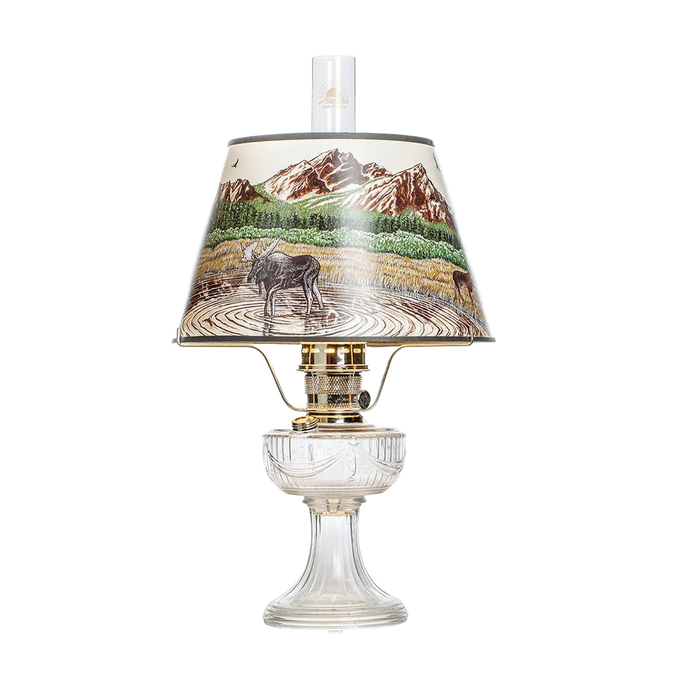 Clear glass oil lamp with brass burner and scenic Rocky Mountain parchment shade depicting wildlife and nature, featured in Lamps & Lighting, Oil Lamps, Table Lamps, Best Sellers, Promo Eligible collections.