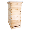 Stacked wooden beehive with multiple compartments and a metal telescoping cover, handcrafted and Amish made, ideal for beekeeping supplies in farm and garden collections.