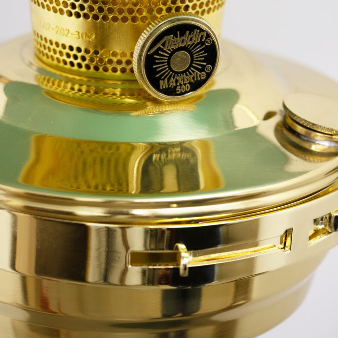 Close-up of gleaming brass adjustment knob and fuel tank on a deluxe hanging oil lamp, showcasing solid construction ideal for Farm, Garden & Tool, Emergency Supplies, and Best Sellers collections.