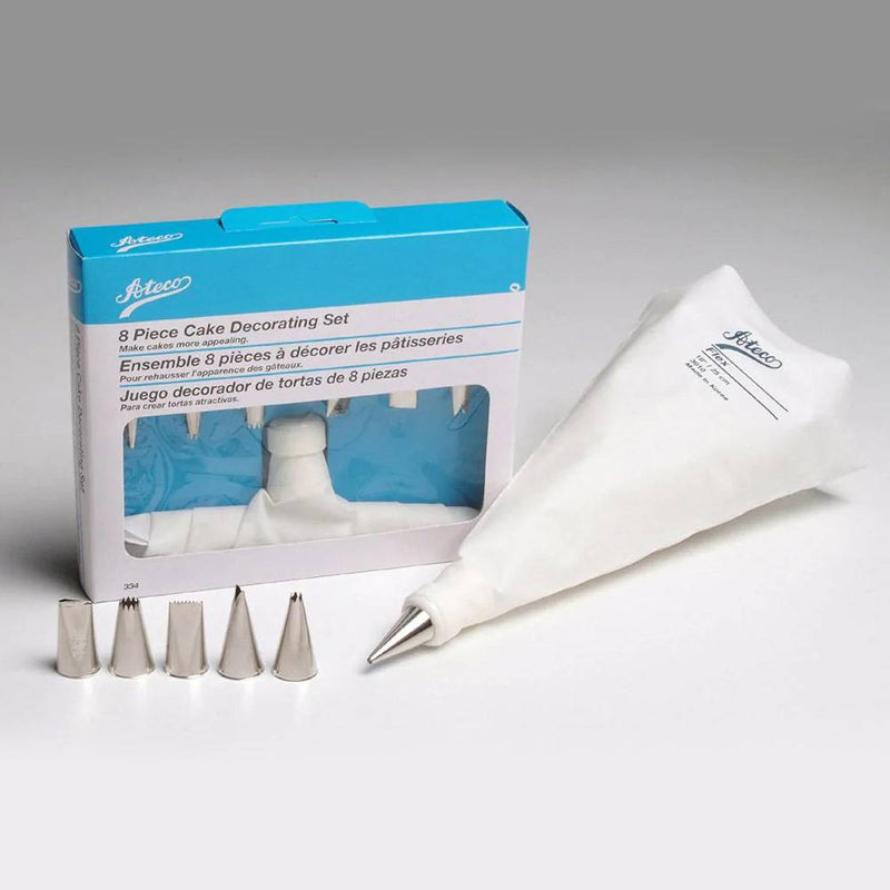 Eight-piece cake decorating set including a 10-inch pastry bag, coupler, and six stainless steel tips, crafted for home baking in Kitchen & Food and Baking Supplies collections.