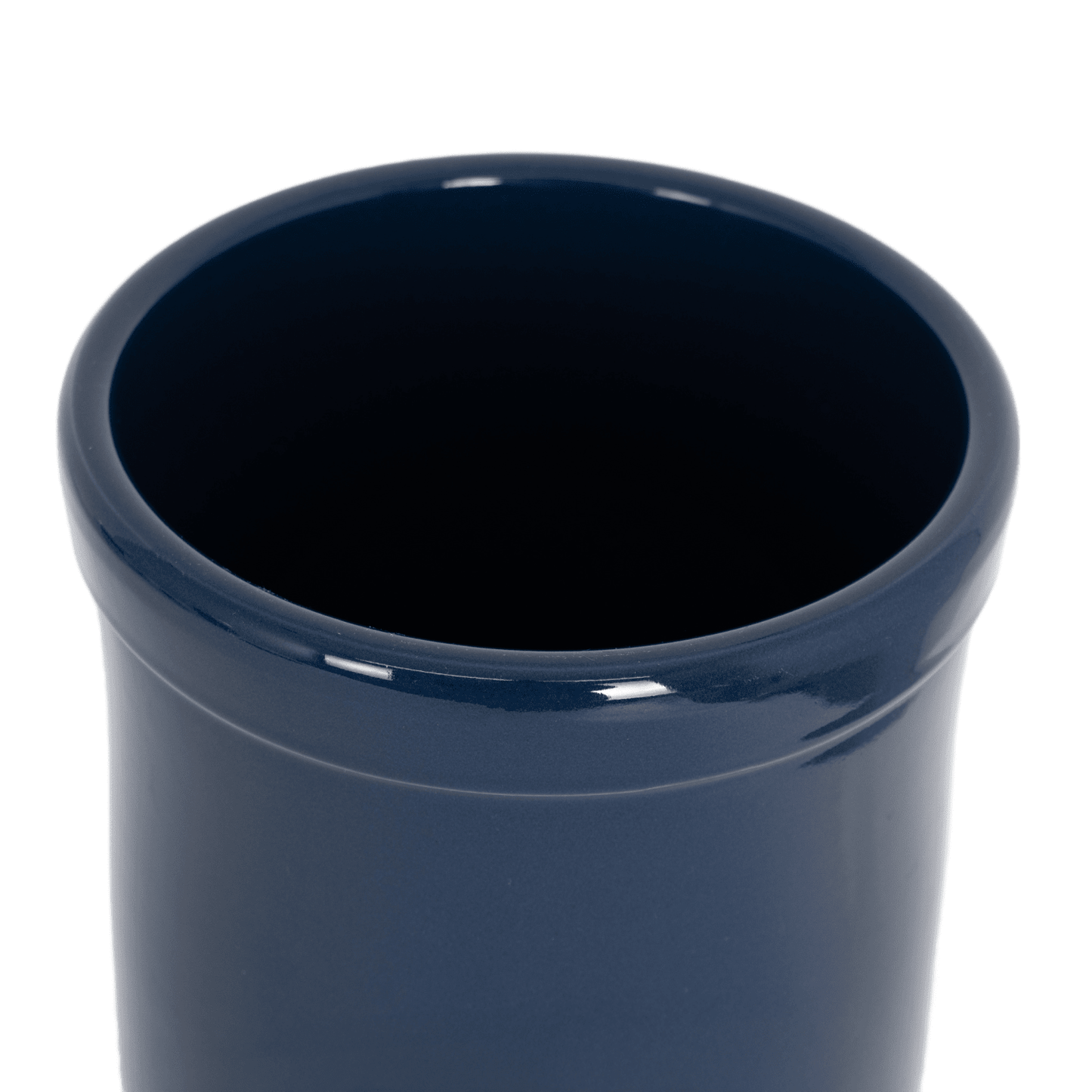 Close-up of a handcrafted, navy blue stoneware crock with food-safe glaze, ideal for Kitchen & Food, Food Preservation, and Fermenting and Pickling collections, made in the USA.