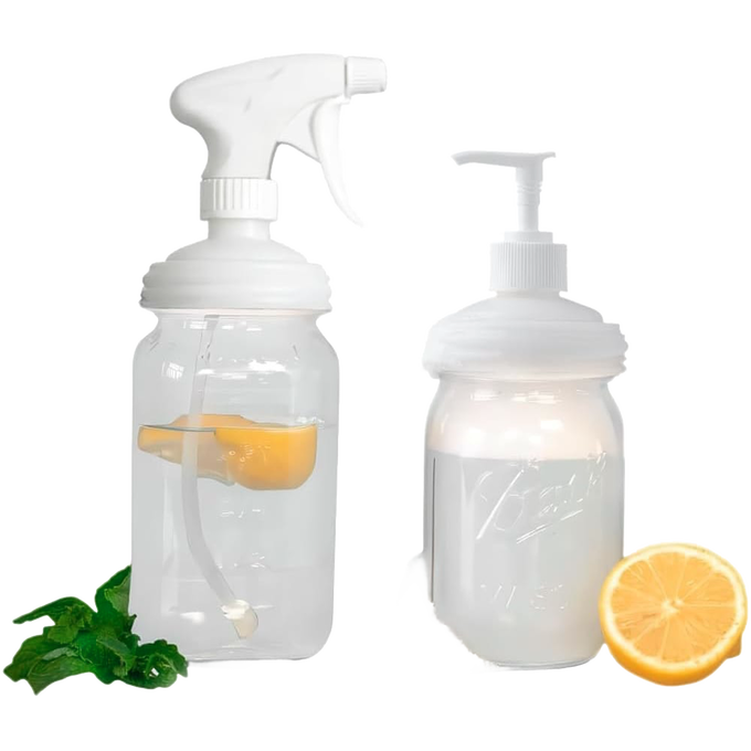 Two clear regular-mouth jar lids—a white plastic sprayer and a pump lid—paired with fresh lemon and mint, eco-friendly household helpers in Home & Decor, USA Made, Best Sellers collections.