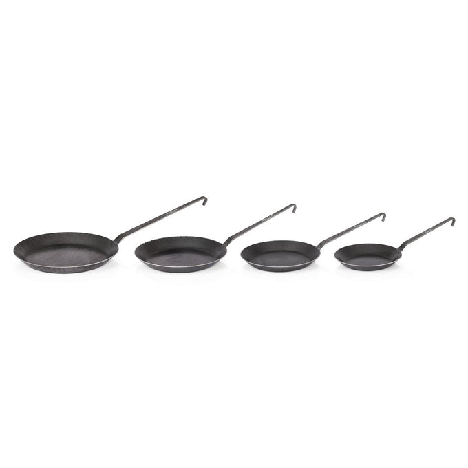 Set of four handcrafted wrought iron pans with long handles and smooth cooking surfaces, designed for versatile use in Farm, Garden & Tool, Kitchen & Food, Camping, Cookware, Pots and Pans, Best Sellers, and Promo Eligible collections.