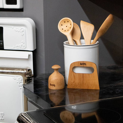 Handcrafted solid American Hard Maple wooden utensils including ladle, spatula, scraper, and tamper in a white ceramic crock on kitchen countertop, perfect for Kitchen & Food, Holiday Hosting, and USA Made collections.