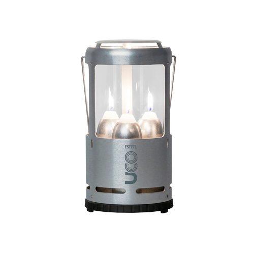 Handcrafted durable candle lantern with three burning candles protected by glass and metal frame, perfect for camping, farm, garden, emergency supplies, and outdoor lighting needs.