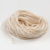 Natural flat-braid cotton wick bundle designed for candle crafting, ideal for use with pillar or taper candles, featured in Candlemaking Supplies, Lamps & Lighting, Best Sellers, and Promo Eligible collections.