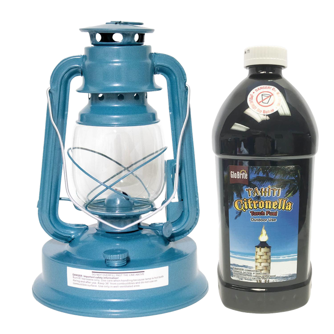 Blue metal mosquito-repellent lantern with clear glass globe next to a black plastic bottle of citronella torch fuel, ideal for outdoor use in farm, garden, camping, and pest control settings.