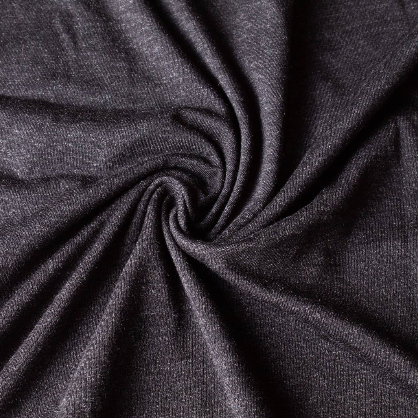 Close-up of soft, lightweight charcoal fabric with a gentle swirl texture, highlighting the comfortable material from Lehman's Comfy T-Shirt, ideal for Health & Wellness and Clothing collections.