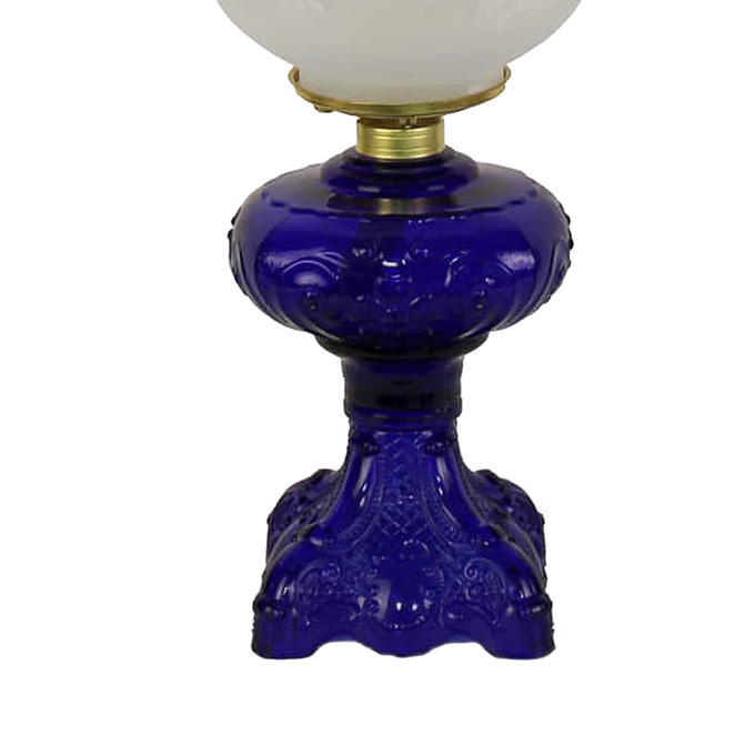 Handcrafted deep blue glass oil lamp base with intricate sculptured details, featuring a brass-plated burner and frosted glass chimney, ideal for Lamps & Lighting, Oil Lamps, Table Lamps, Best Sellers, Promo Eligible collections.