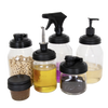 Set of seven black reusable lids for Mason jars featuring diverse functional tops including flip, pump, spray, and pour spout, handcrafted in the USA for Home & Decor, Household Helpers, and Best Sellers collections.