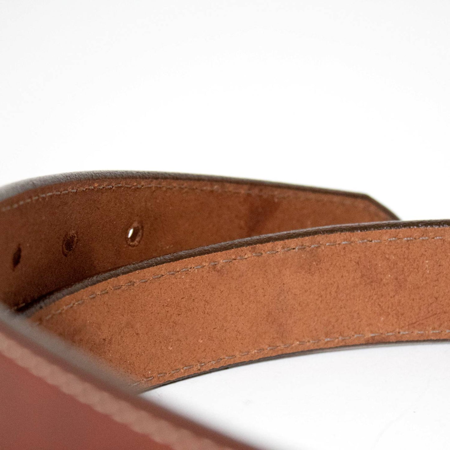 Handcrafted Amish-made rich brown genuine English bridle leather belt with subtle stitching and punched adjustment holes, featured in Clothing and Accessories, USA Made, Best Sellers.