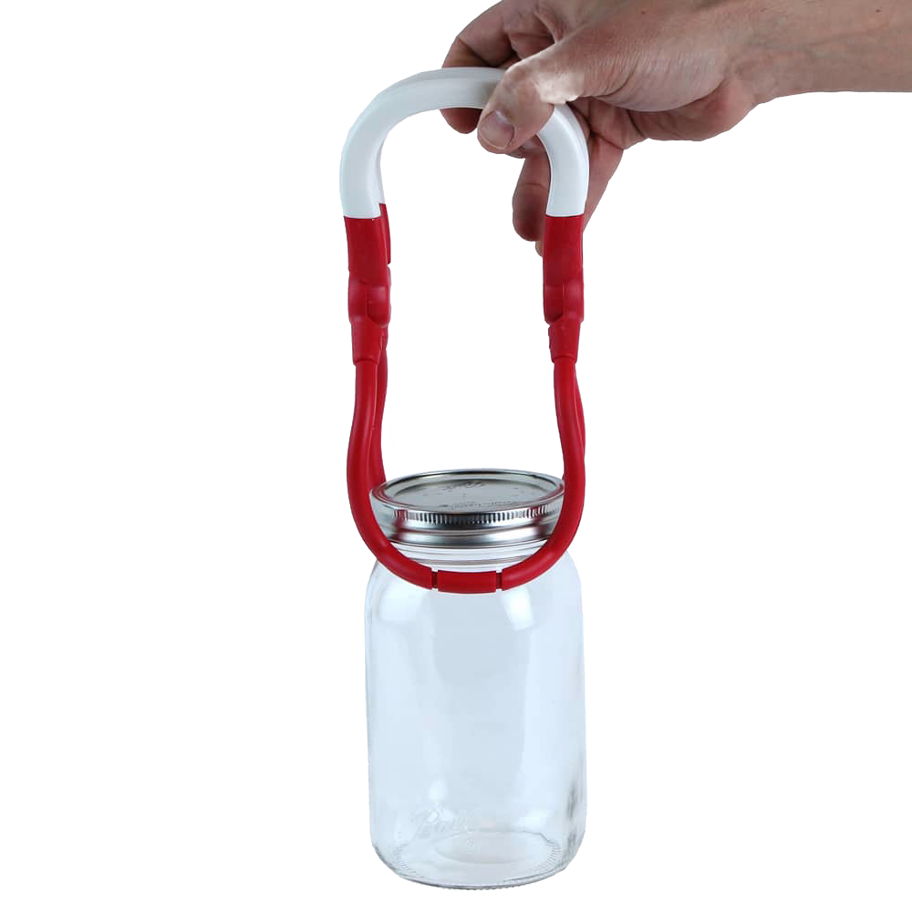 Hand lifting a clear glass canning jar with a metal lid using a red and white jar lifter tool, designed for safe handling during food preservation, ideal for Kitchen & Food and Canning collections.