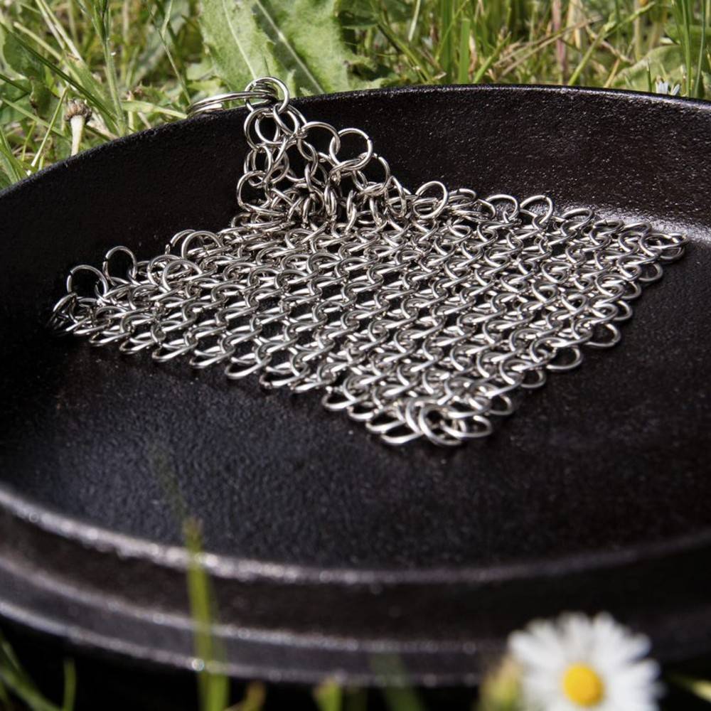 Stainless steel chainmail scrubber with interlocking rings and keyring handle, handcrafted for cleaning cast and wrought iron cookware, featured in Home & Decor and Household Cleaning collections.