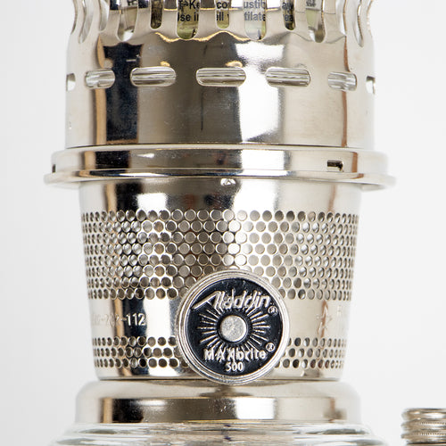 Close-up of a polished metal wick adjustment knob marked "Aladdin MaxBrite 500" on a handcrafted vintage-style oil lamp, perfect for Lamps & Lighting and Best Sellers collections.