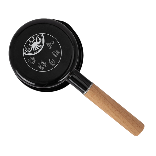 Black enamel pan with a smooth wooden handle and decorative etchings on the base, designed for durable outdoor cooking in Camping, Kitchen & Food, Cookware, Farm, Garden & Tool, and Best Sellers collections.