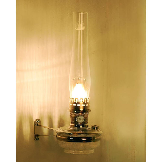 Handcrafted clear regency-style wall oil lamp with bright flame, featuring a polished metal base and tall glass chimney, ideal for Farm, Garden & Tool, Lamps & Lighting, and Emergency Supplies collections.