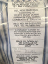 Close-up image of a product tag detailing white duck down filling with minimum 75% down, sterilized contents, 100% cotton cover, and manufacturing information from Grand Rapids, Michigan, suitable for Home & Decor, Home Textiles, Best Sellers, and Promo Eligible collections.